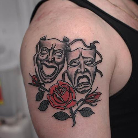 10 Dramatic Theatre Mask Tattoos