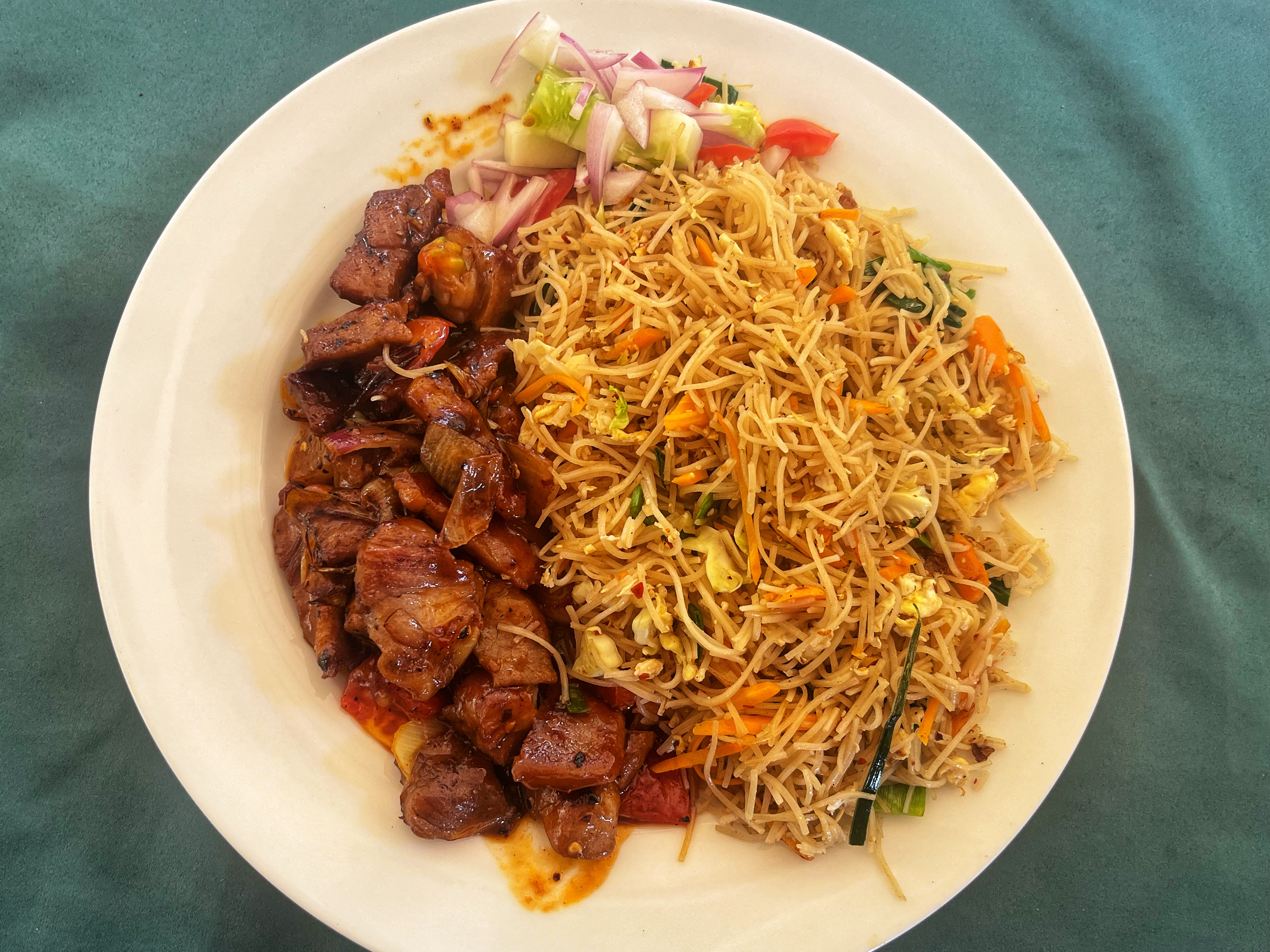 Sri Lankan deviled pork with noodles