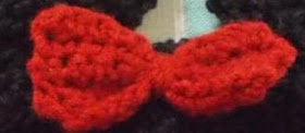 Sweet Nothings Crochet free crochet pattern blog, close up photo of the little Minnie mouse cap showing the bow