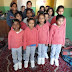Newly admitted girls get new winter clothes and new shoes