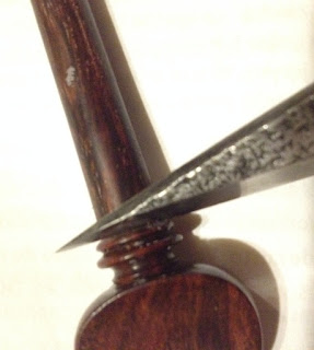 Violin peg shaving