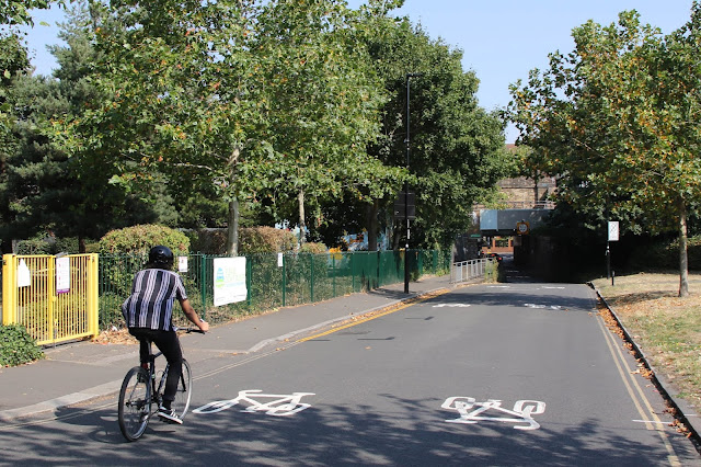 A cyclist on Fisher's Lane