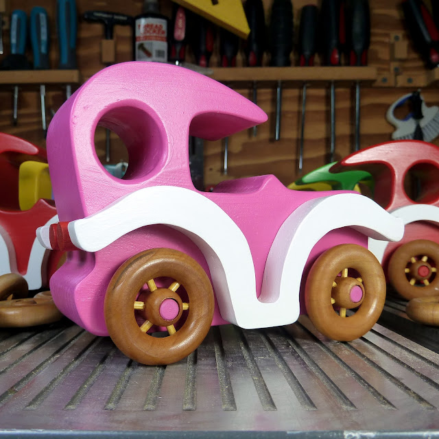 Wooden Toy Car, Model-T Sedan, Handmade and Finished with Pink & White Acrylic Paint and Amber Shellac Bad Bob's Custom Motors Series #odinstoyfactory #handmade #woodtoys #madeinusa #madeinamerica