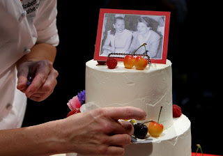 Wedding cake from June 16, 2008, San Francisco City Hall, showing portrait of Phyllis and Del from the first year of their relationship -- Photo from Getty Images