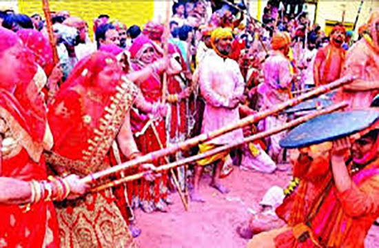 This image is showing the Lathmar Holi in Uttar Pradesh