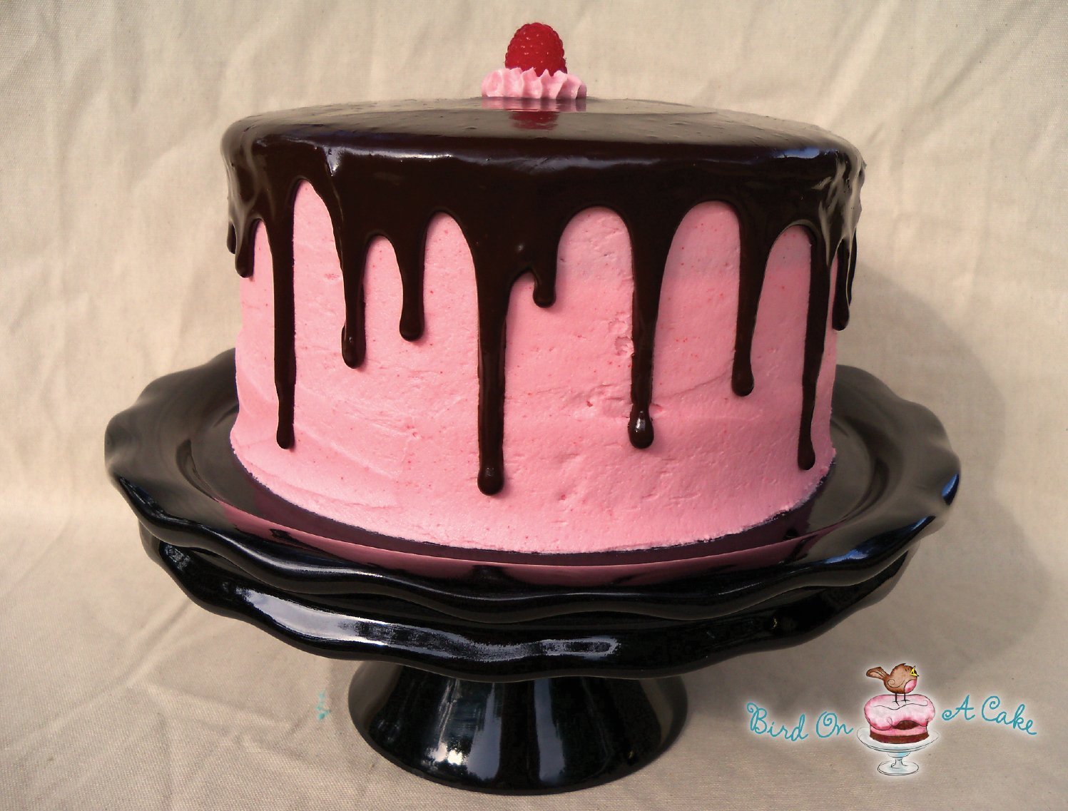 chocolate cake with chocolate chips cake slowly moving outward in circles smooth the top of the cake with 