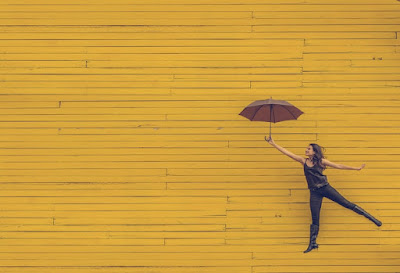 Happy Woman with Umbrella