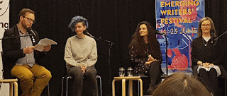 Michael Earp, Alison Evans, Demet Divaroren and Fiona Wood on stage in front of an Emerging Writers Festival banner.