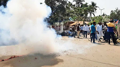 Trinamul supporters burst sound crackers to mark the launch of the campaign by Raiganj party nominee Kanaialal Agarwal