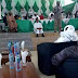 Governor Nasir El-Rufai sits on the floor during a meeting