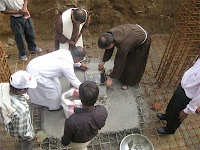 Laying the foundation stone for an addition to the school in Lucknow