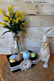 Vintage, Paint and more... Plain tin DIY'd with chalkboard paint and drop cloth fabric, yarn wrapped  Easter eggs, vintage milk bottle, vintage wood rabbit, and sisal placemat