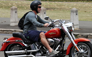 Marie Liarris' husband Brad riding a bike