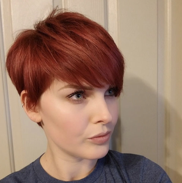 side shaved pixie haircut with bangs