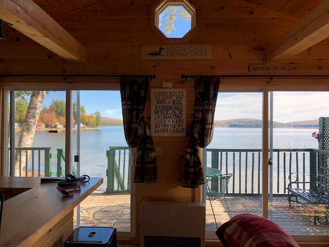 cabin sliding doors overlooking a lake