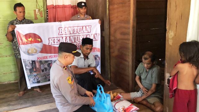 Bantuan Kemanusiaan Polsek Peureulak Barat Untuk Warganya