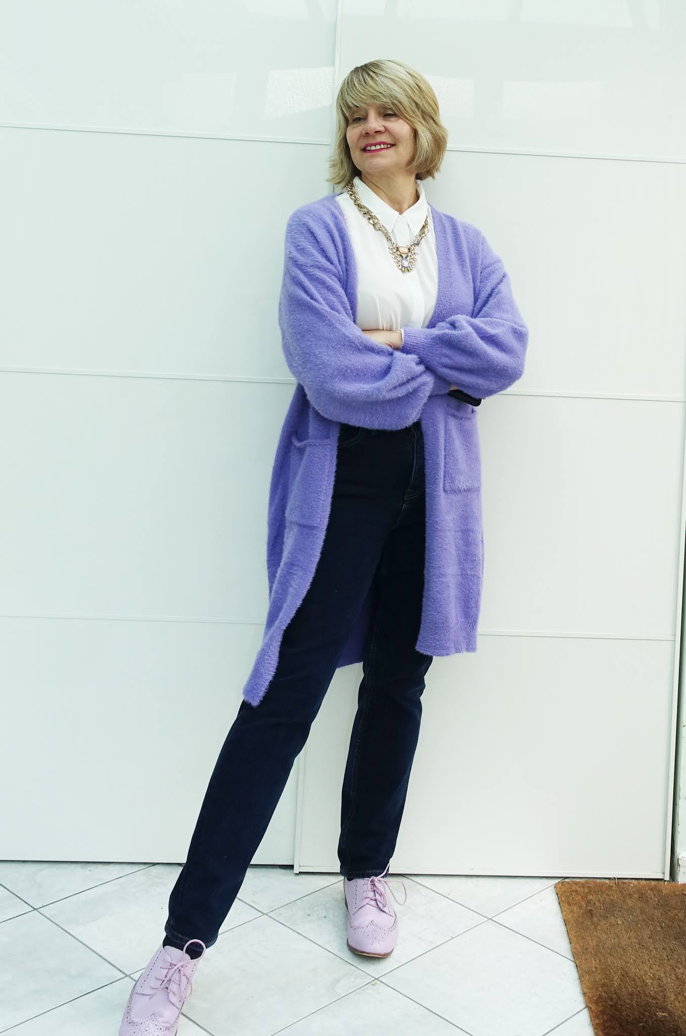 A long lilac cardigan with matching brogue shoes and jeans
