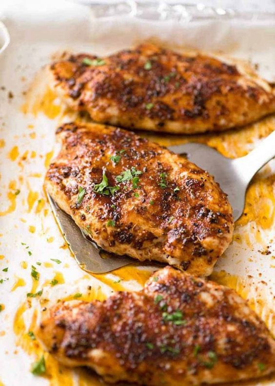Recipe VIDEO above. My tips for a truly juicy, Oven Baked Chicken Breast: a touch of brown sugar in the seasoning which makes the chicken sweat while it bakes so it creates a semi "sauce", and cooking
