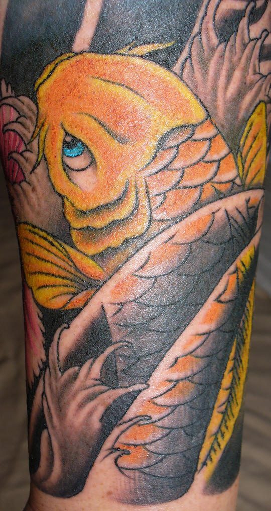 Koi designs make for extraordinarily colorful koi fish tattoos