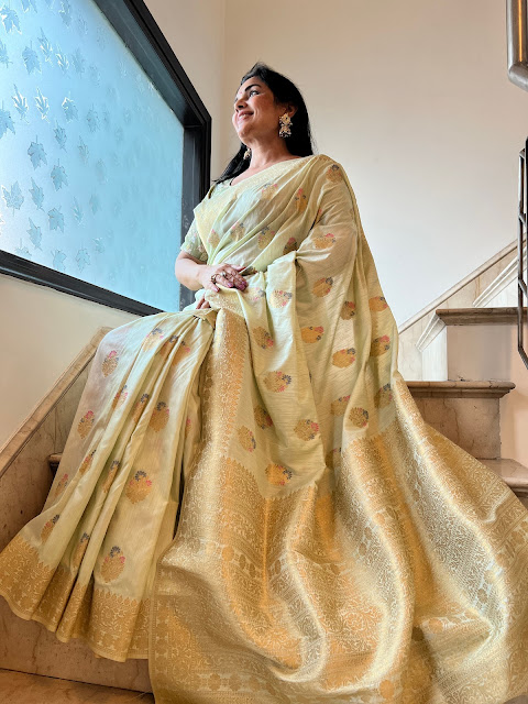 Mint green Tussar Banarasi saree with meenakari butas.