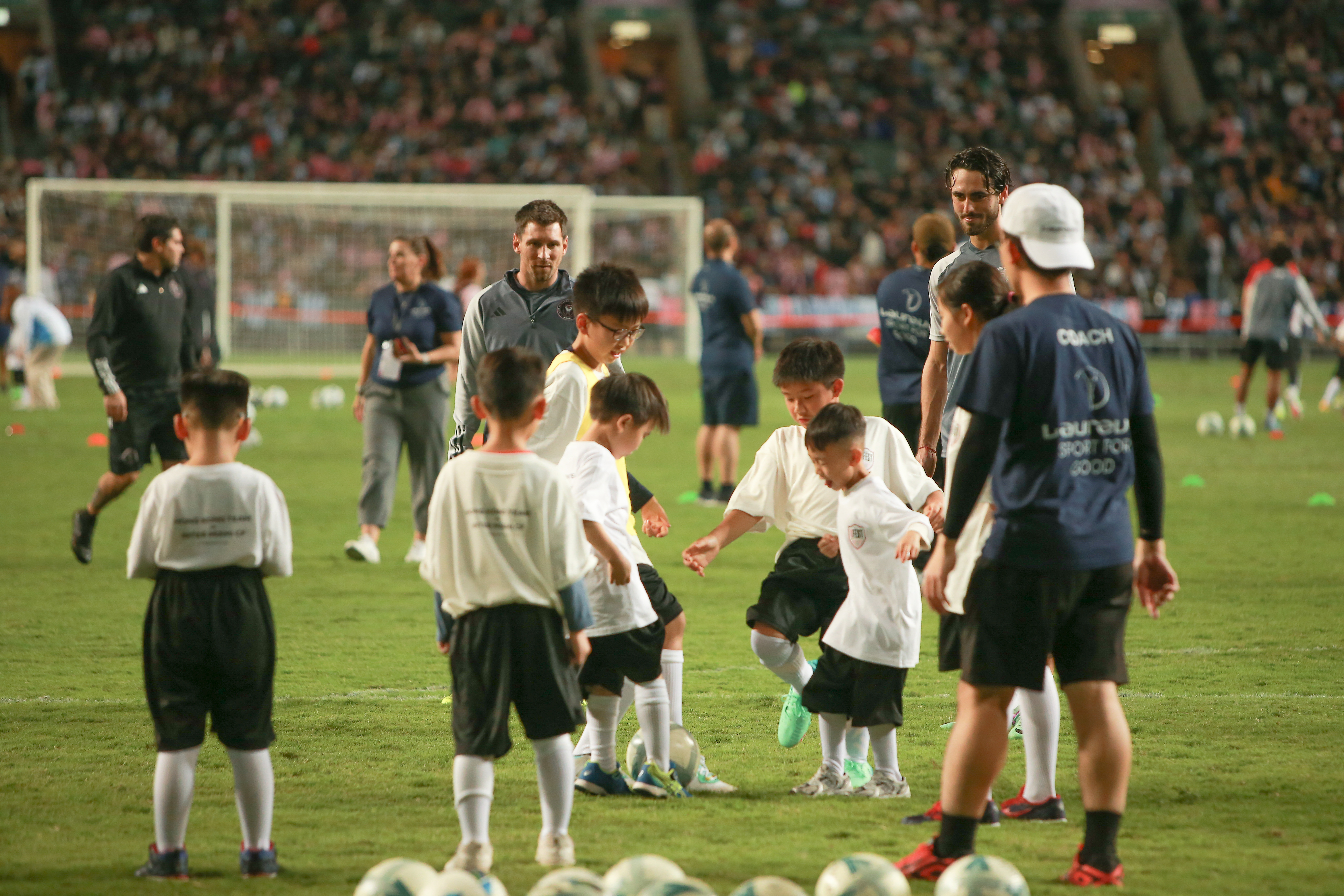 Messi training with the kids.