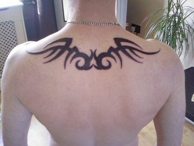 Upper back tribal tattoos for men