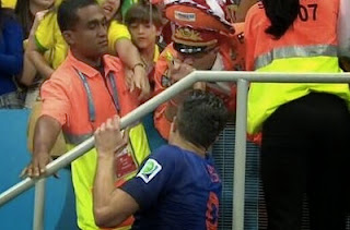 http://purelyfootball.com/2014/07/12/robin-van-persie-gives-world-cup-medal-armband-dutch-fan/