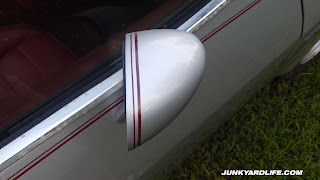Cosmetic restoration several years ago brought new paint, interior, and pin stripes.