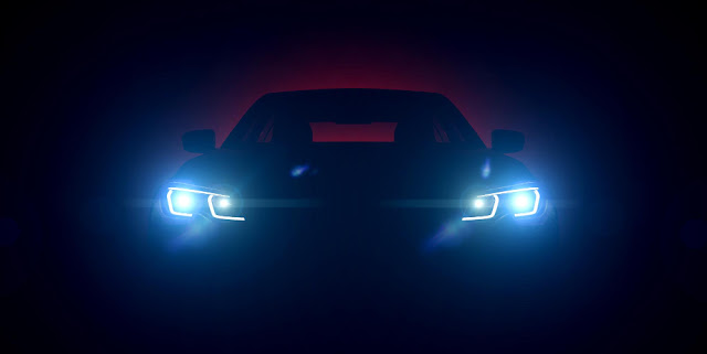 front-view-turning-headlights-car-night