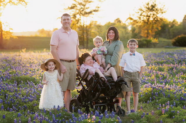 Bluebonnet field family portrait