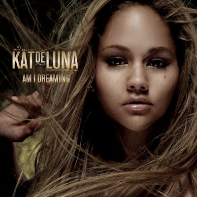 Kat DeLuna 9 Lives single cover era featuring Whine Up Am I Dreaming 