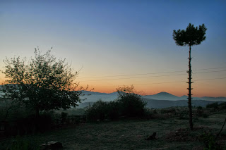 Mist in the valley and peach skies