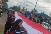 Meriahkan HUT RI Ke-77, Bendera Merah Putih 1000 M Dibentangkan dan Diarak Di Kota Nabire