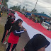 Meriahkan HUT RI Ke-77, Bendera Merah Putih 1000 M Dibentangkan dan Diarak Di Kota Nabire