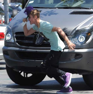 Bieber rushing toward the photographer 