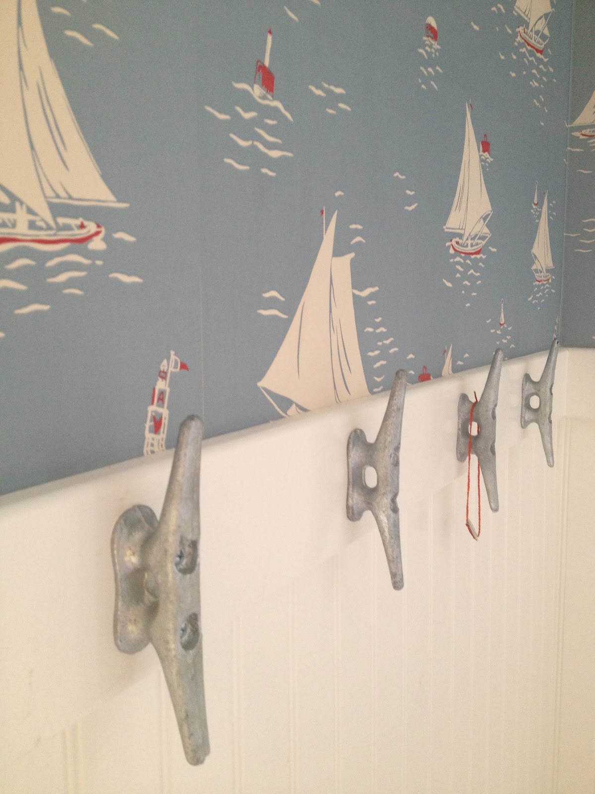 This Old Coconut Grove: cabana bathroom wallpaper & boat cleats