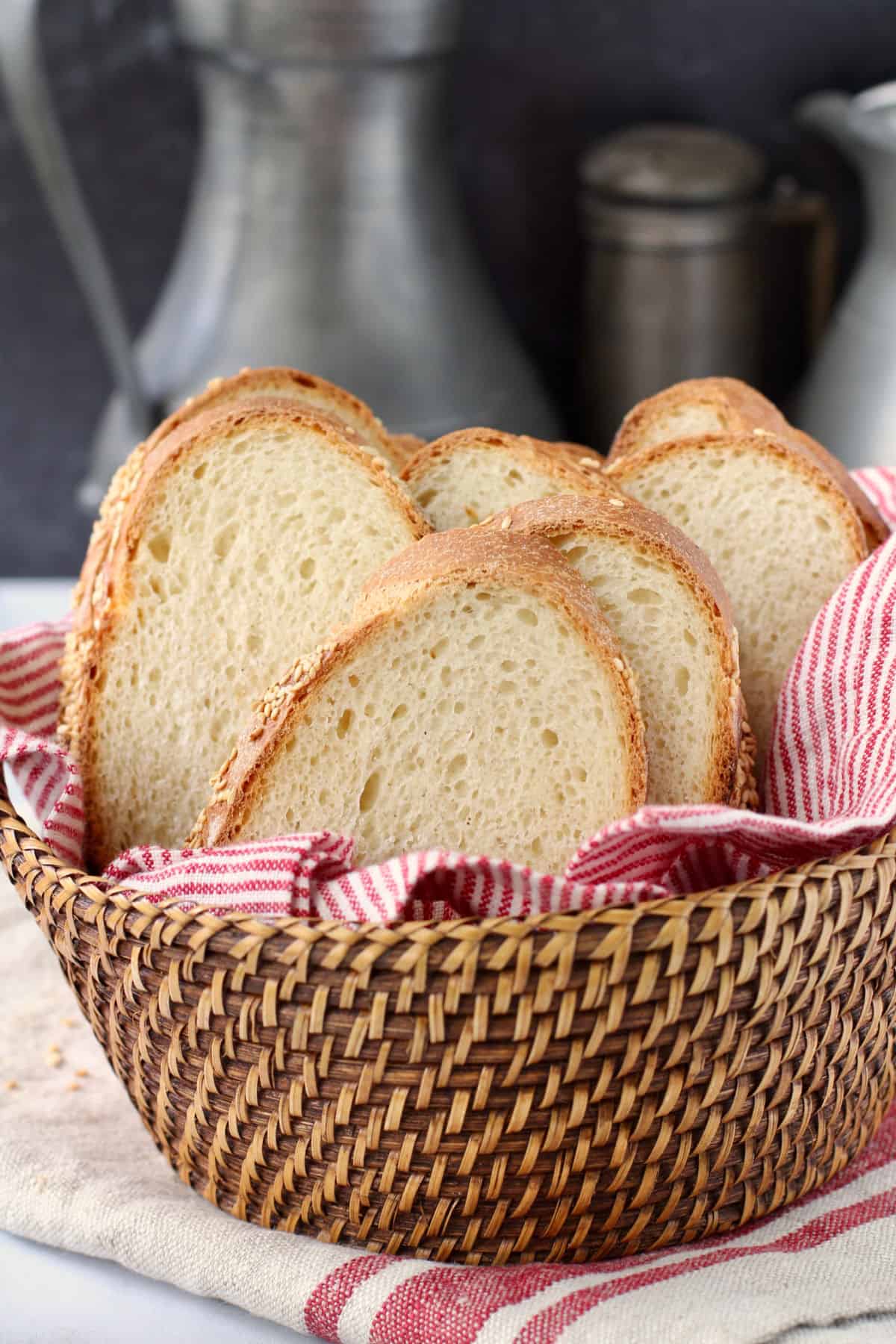 Greek Village Bread (Horiatiko Psomi) slices in a basket.