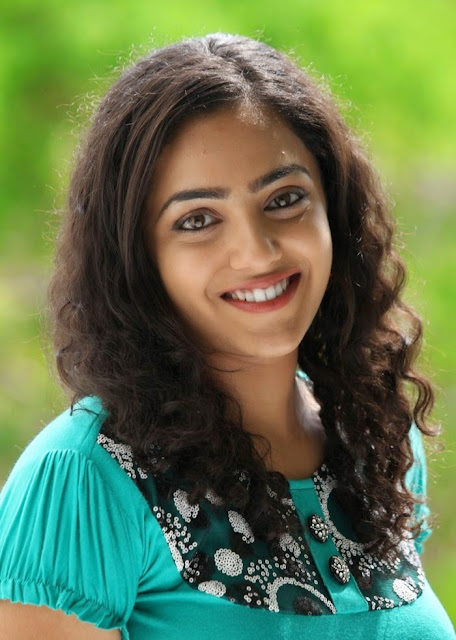 Nithya Menon Spicy Indian Film Actress and Playback Singer very beautiful and hot sexy stills Wallpapers Free Download