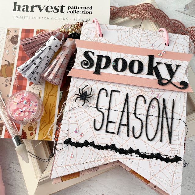Spooky season mini album with paper tassels made with Scrapbook.com festive alpha die, harvest paper pad