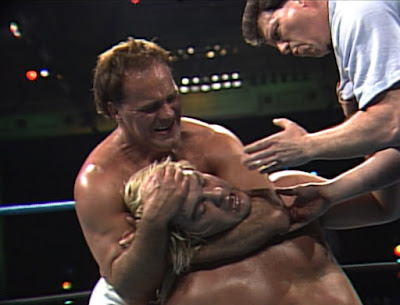 WCW Superbrawl II (1992) - Larry beats up Barry