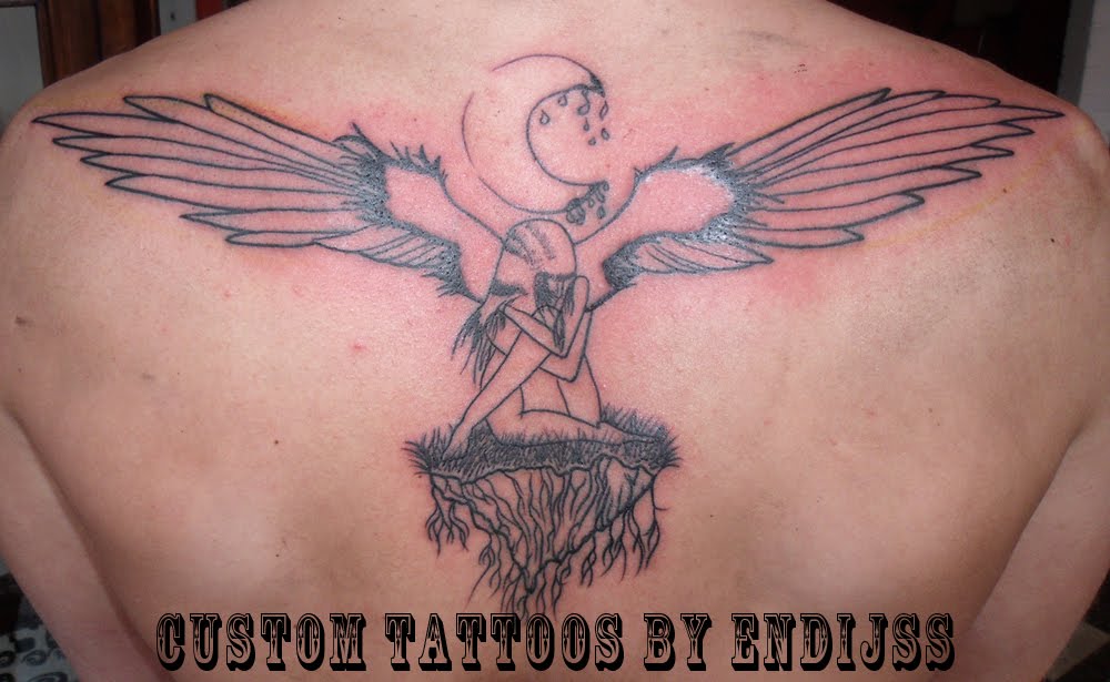 evil angel tattoos. (evil angel) has tattoos