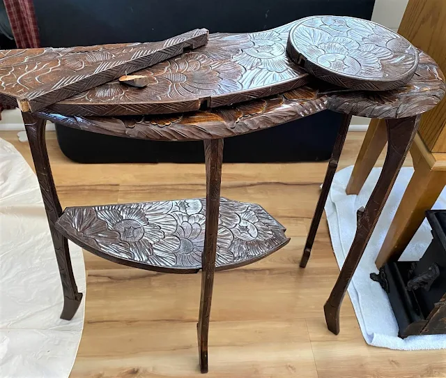 Photo of a vintage carved top table.