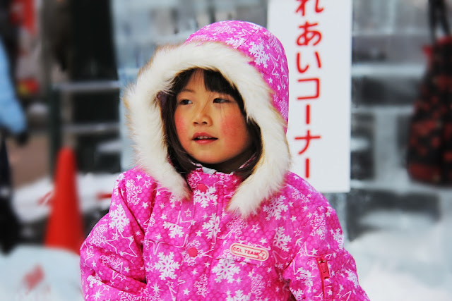 Child Enjoying Snow
