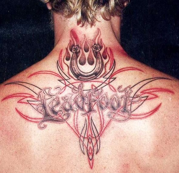 cross tattoos for men on back. upper ack tattoo for men