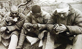 Japanese POWs, 29 January 1942 worldwartwo.filminspector.com