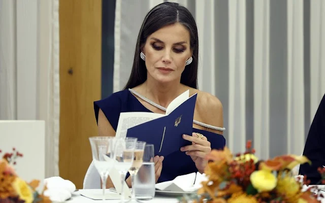 Queen Letizia wore a navy blue off-shoulders diamante midi dress by Bouret. First Lady Sanja Music Milanovic