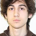 Boston bomb suspect Dzhokar Tsarnaev had gunshots : court papers