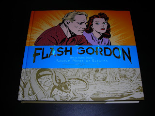 My copy of Flash Gordon: Radium Mines of Electra (Dailies 1940-1942). The cover depicts Flash and Dale.