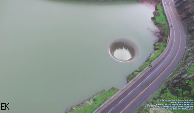 Man Notices Massive Hole In Lake, Flies His Drone Into It And Captures Incredible Footage