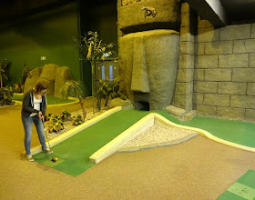 Emily playing at Paradise Island Adventure Golf in the Trafford Centre, Manchester